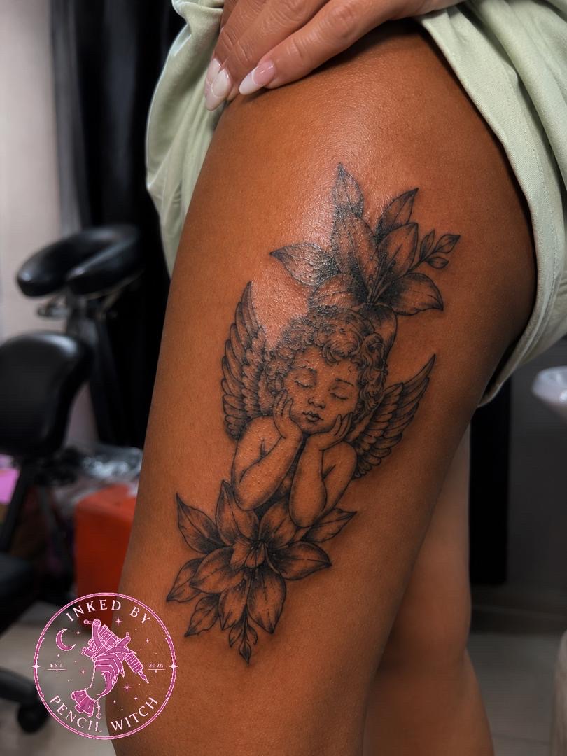 Sleeping cherub with lilies on the thigh, fine line and soft shading